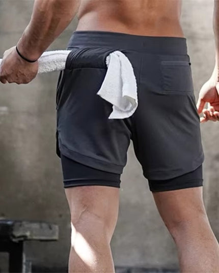 FUSION-shortsit - Tummanharmaat treenishortsit miehille