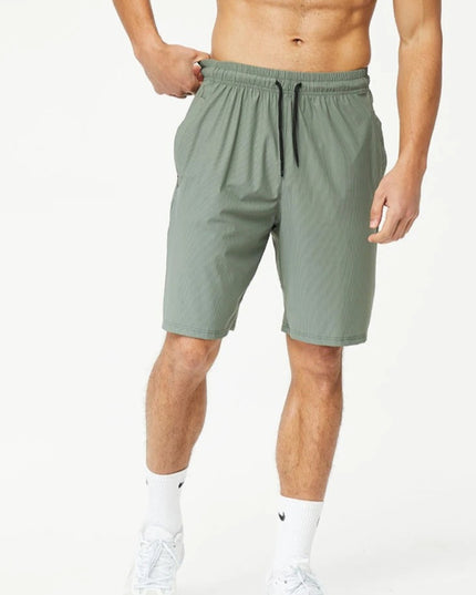 Pace Grid -shortsit - Vihreät treenishortsit miehille