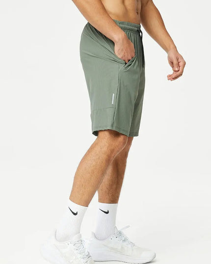 Pace Grid -shortsit - Vihreät treenishortsit miehille