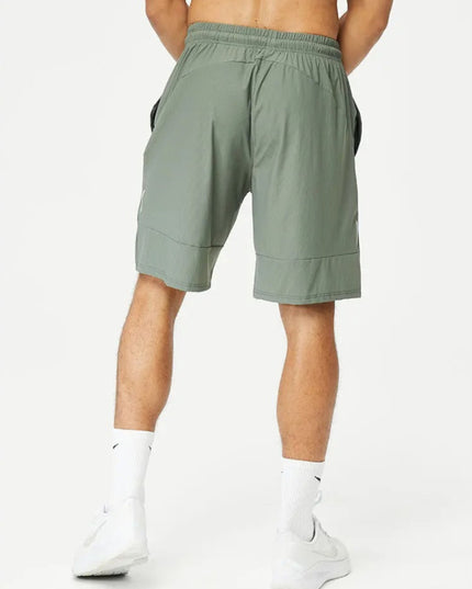 Pace Grid -shortsit - Vihreät treenishortsit miehille