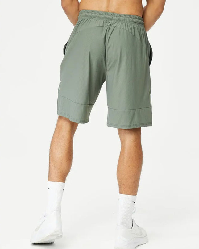 Pace Grid -shortsit - Vihreät treenishortsit miehille