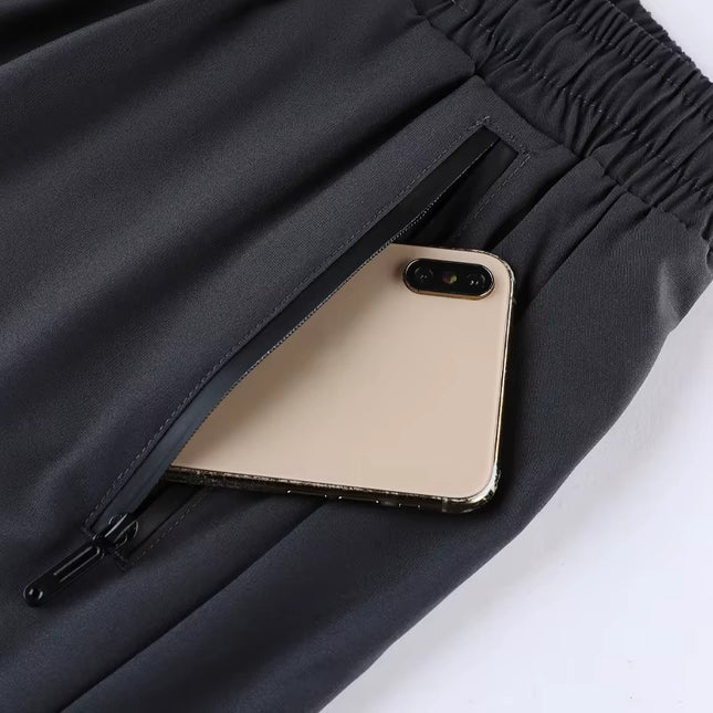 CoreLayer Pants - Harmaat camokuvioiset miesten shortsit trikoineen